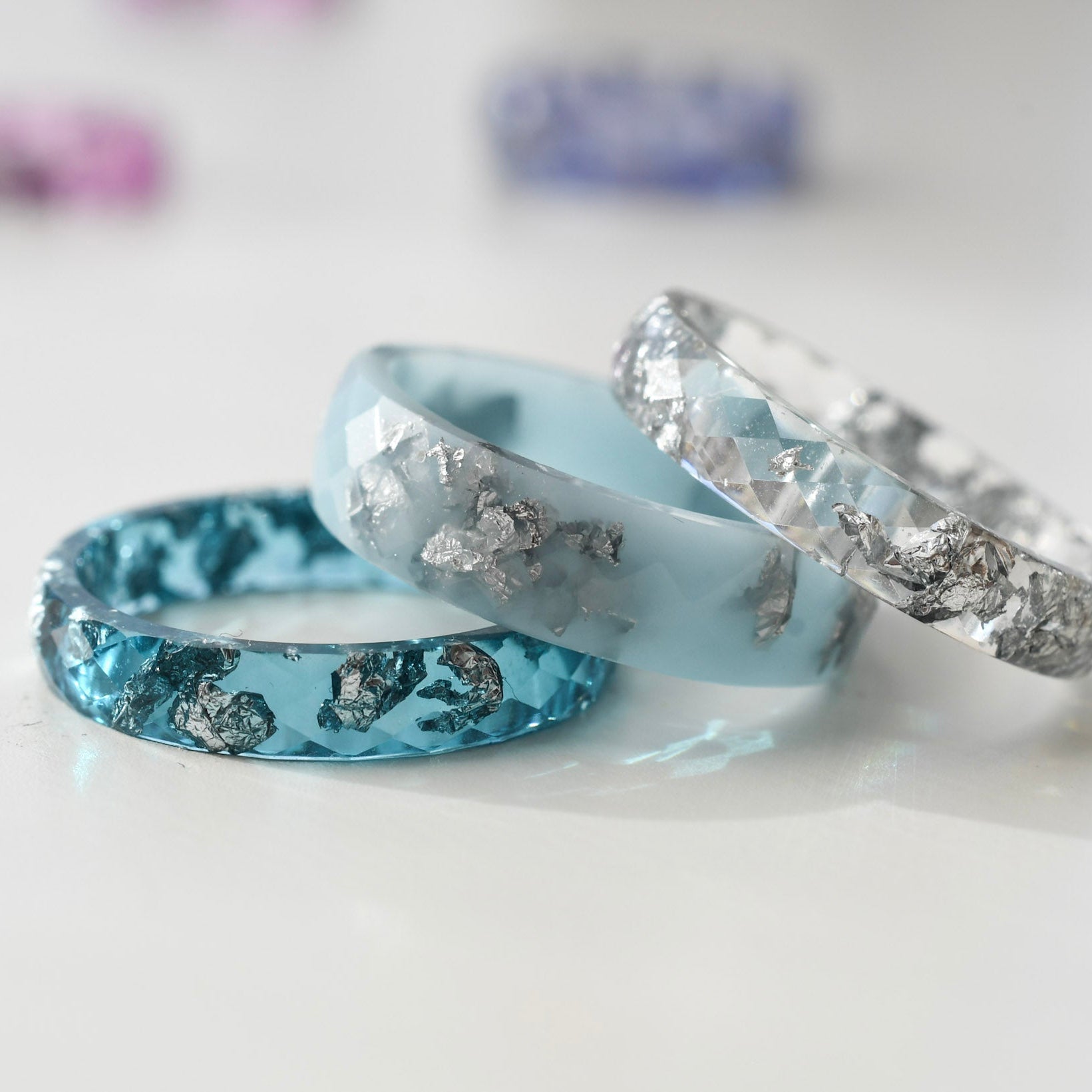 Aqua mist transparent rings with silver flakes