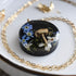 natural-elements-pendant-moss-mushroom-blue-flowers-resin-jewelry.jpg