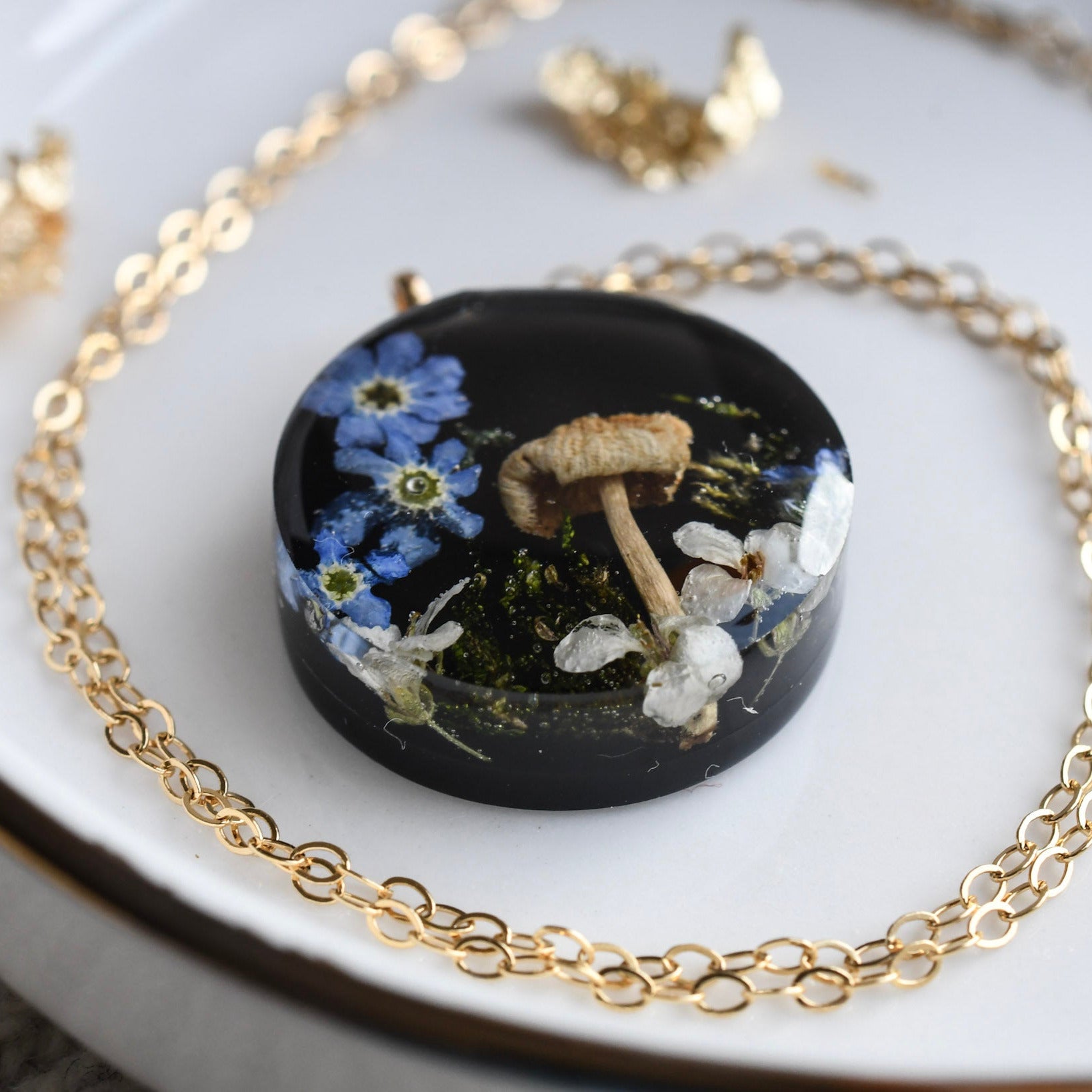 natural-elements-pendant-moss-mushroom-blue-flowers-resin-jewelry.jpg