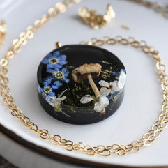 natural-elements-pendant-moss-mushroom-blue-flowers-resin-jewelry.jpg