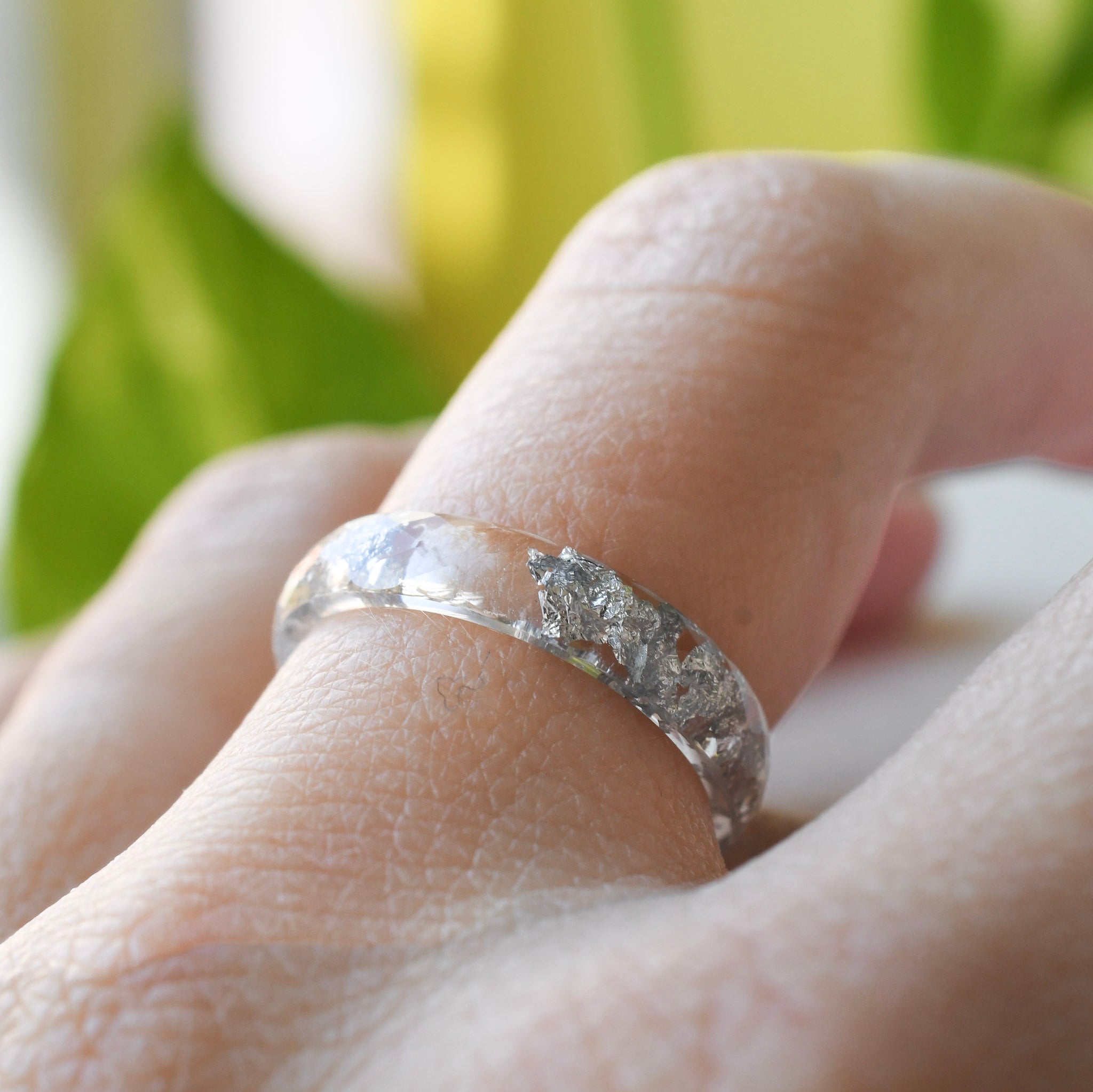 Slim faceted clear resin stacking ring with metallic silver leaf handmade in Vienna