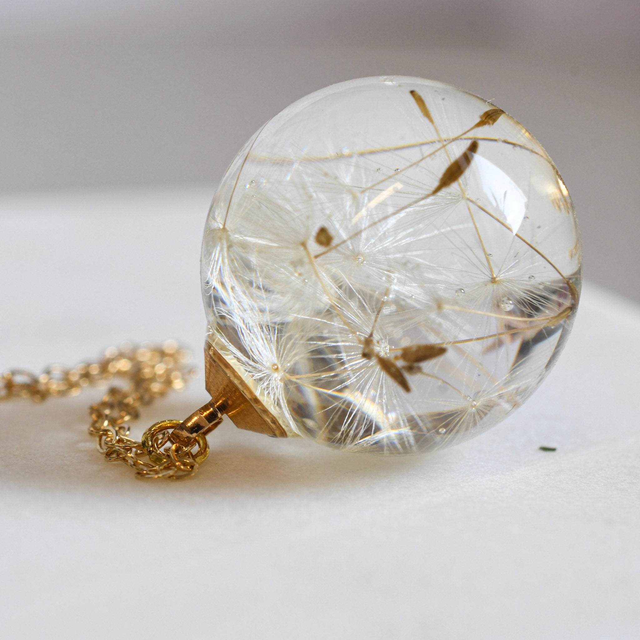 Real dandelion seed preserved in resin sphere necklace Vienna