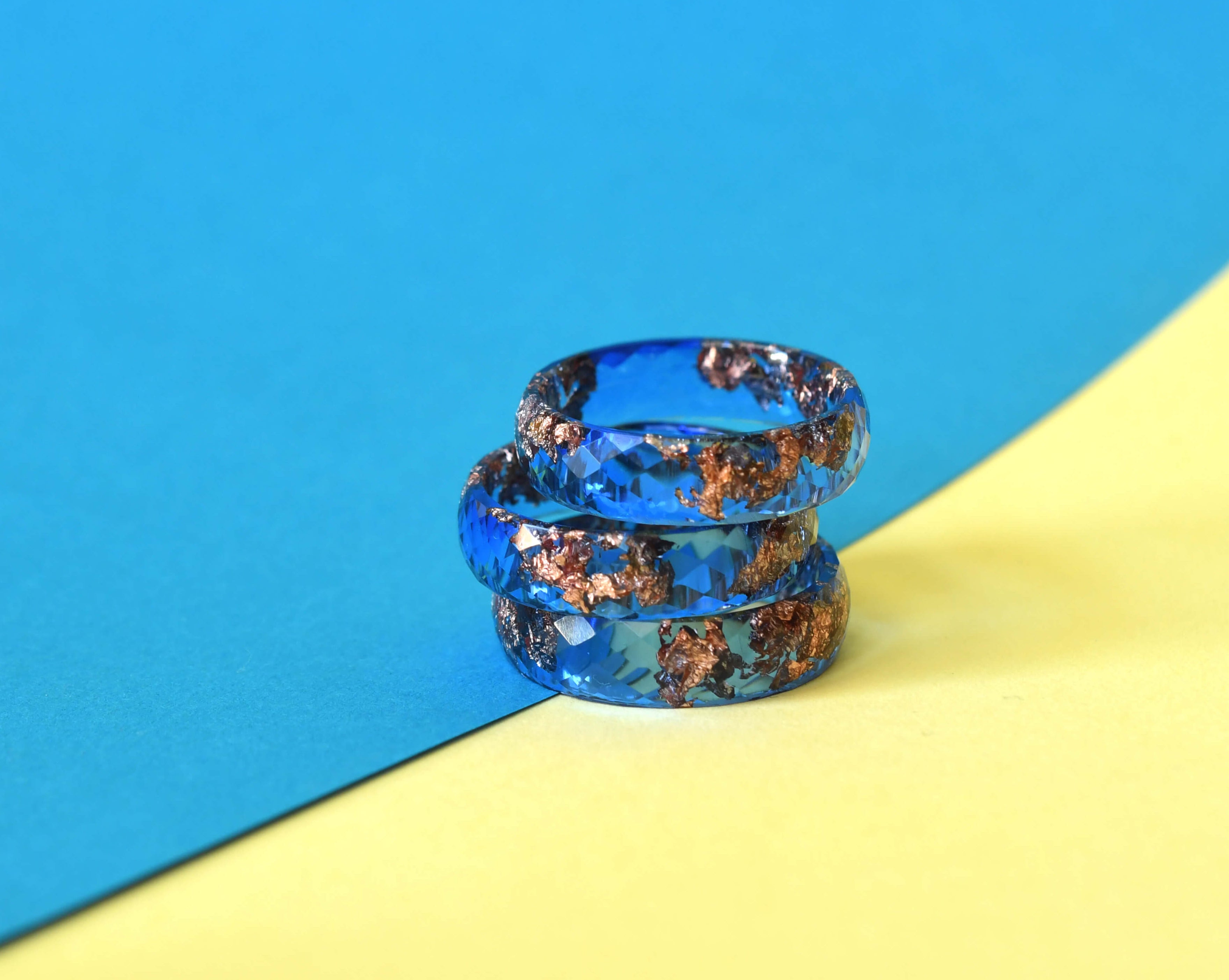Rich cobalt resin ring with metallic rose gold shimmer Vienna