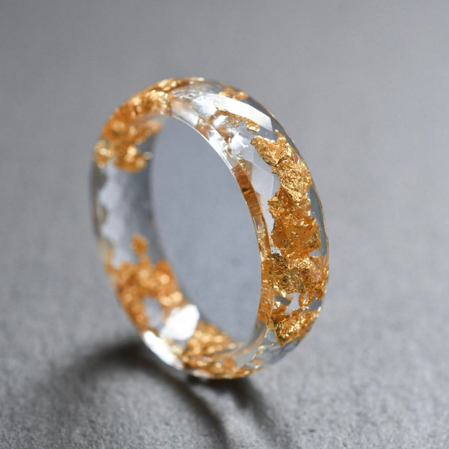 faceted clear resin ring with gold flakes