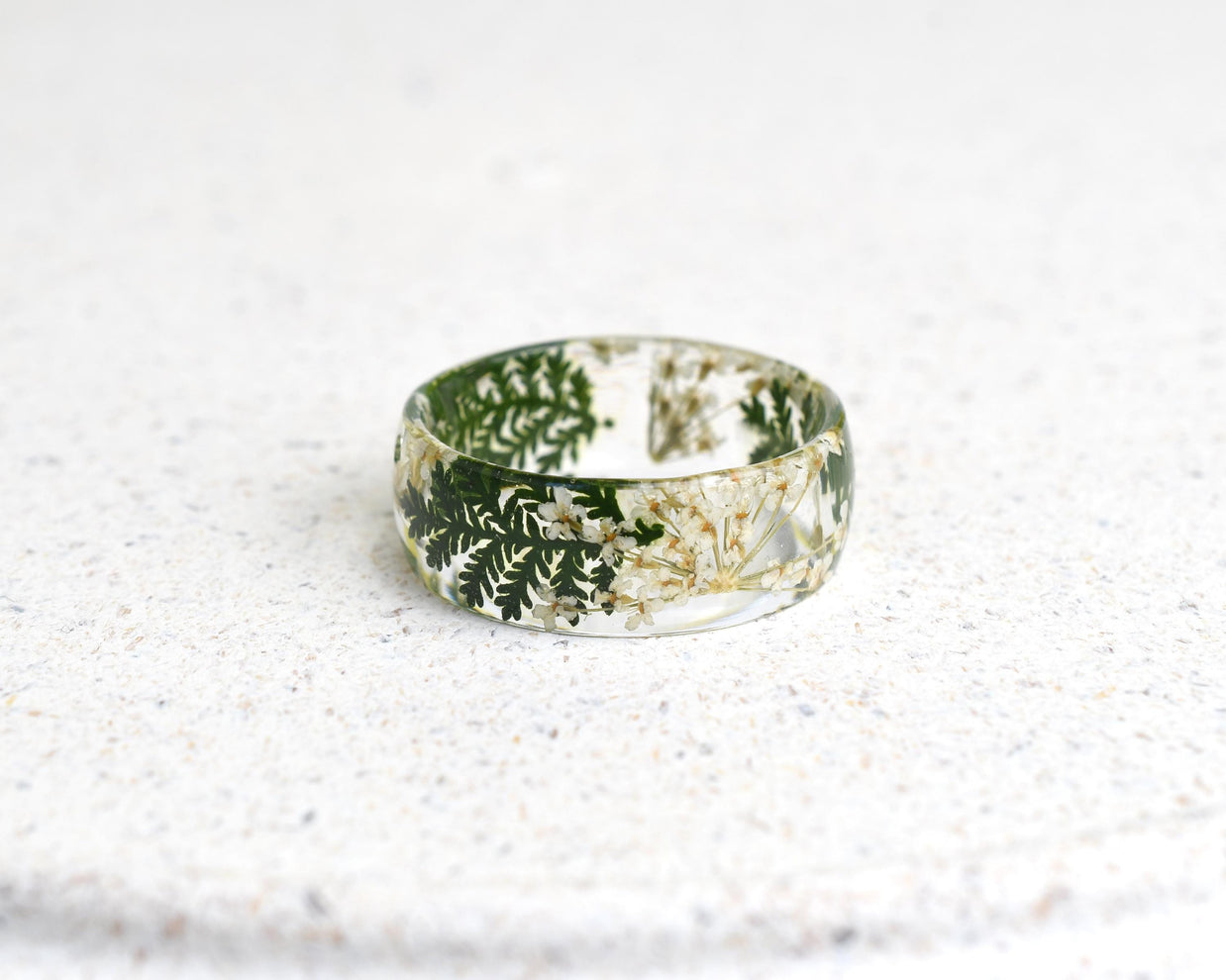 Handmade resin ring with white flowers and foliage