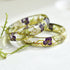 Resin ring with dried alyssum flowers and moss
