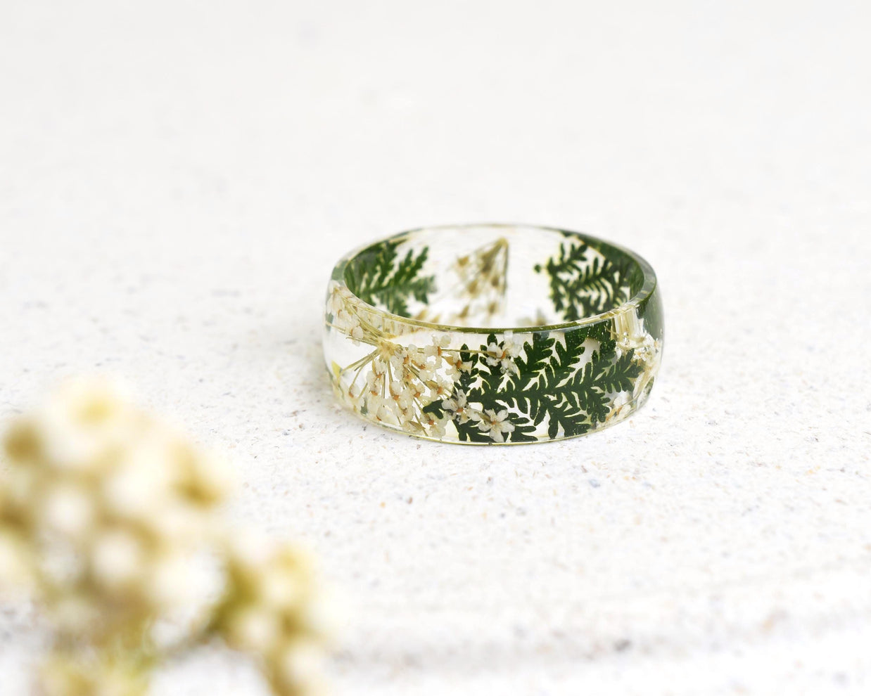 Resin ring with real Queen Anne’s lace flowers and green leaves