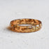 amber colored resin ring with gold flakes