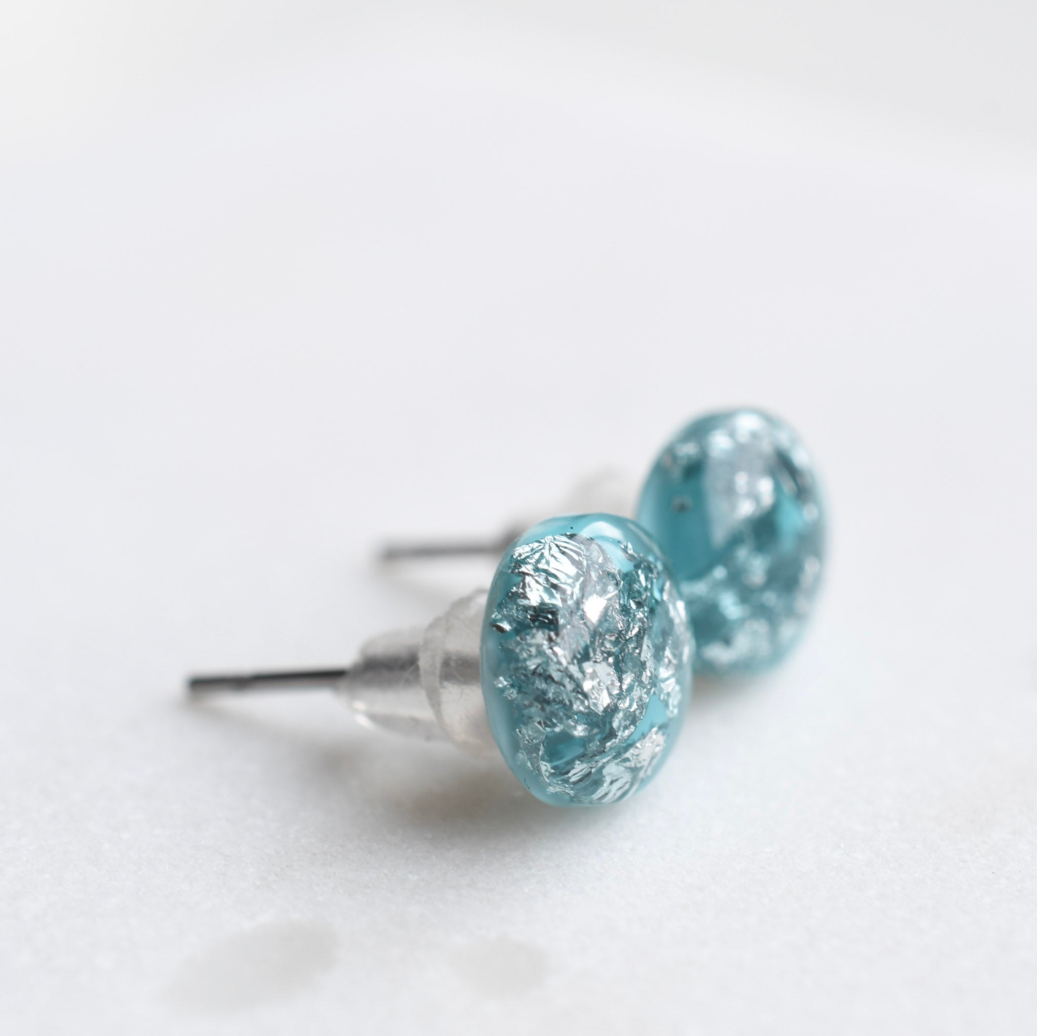 8mm aqua blue stud earrings with shimmering silver leaf
