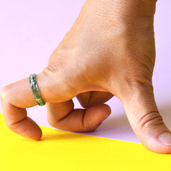 Handmade aqua and silver resin ring worn on hand