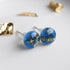 Blue resin stud earrings with gold leaf handmade by Resity in Vienna