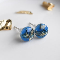 Blue resin stud earrings with gold leaf handmade by Resity in Vienna