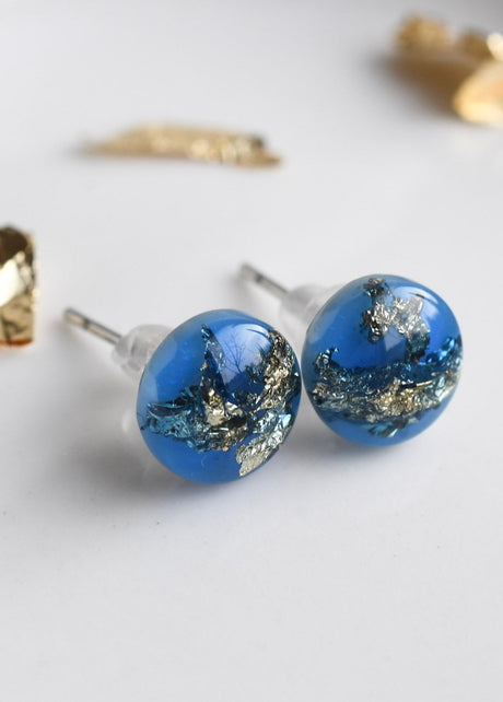 Blue resin stud earrings with gold leaf handmade by Resity in Vienna