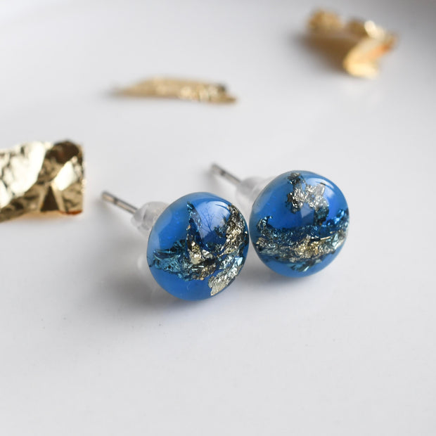 Blue resin stud earrings with gold leaf handmade by Resity in Vienna