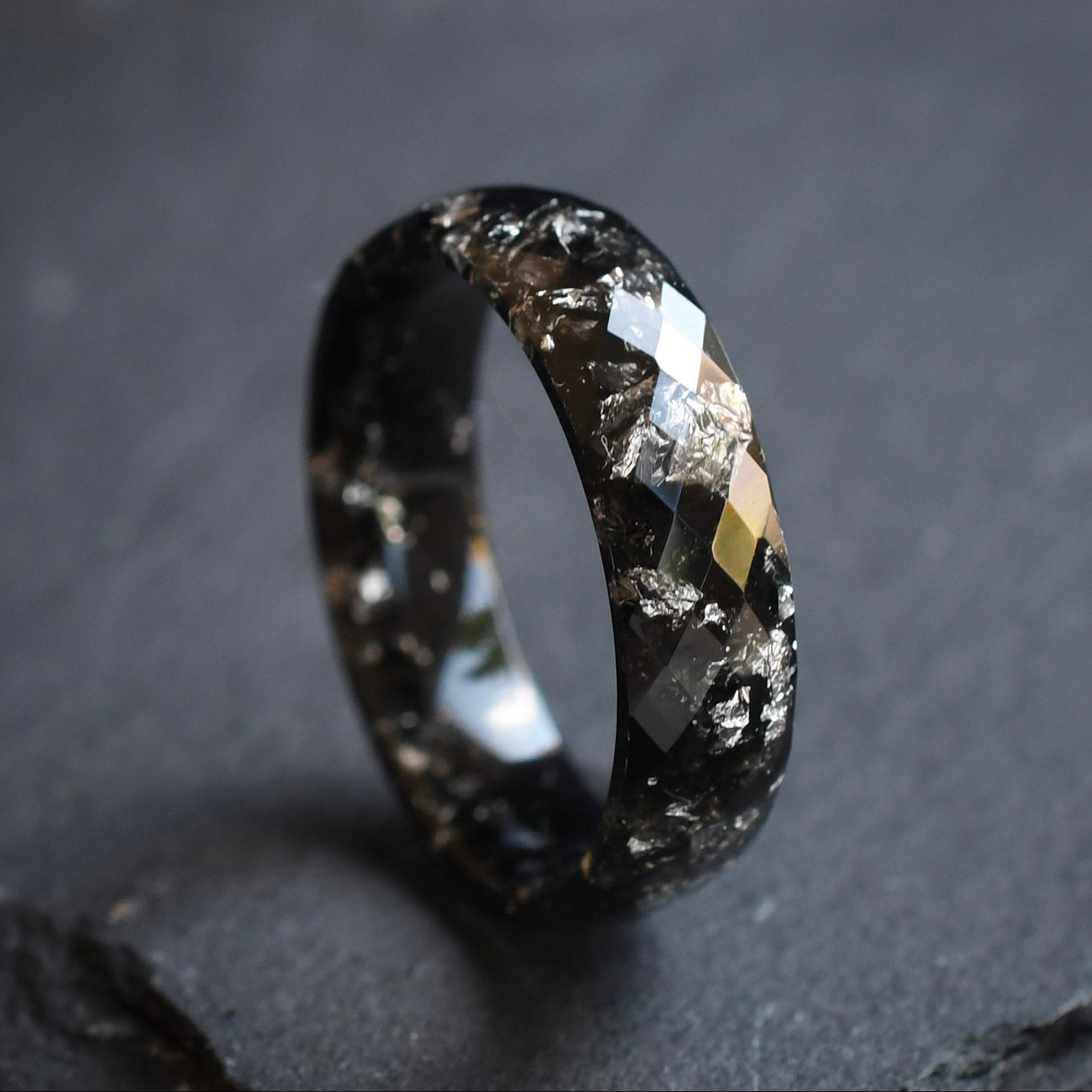Black faceted men’s band with metallic silver flakes