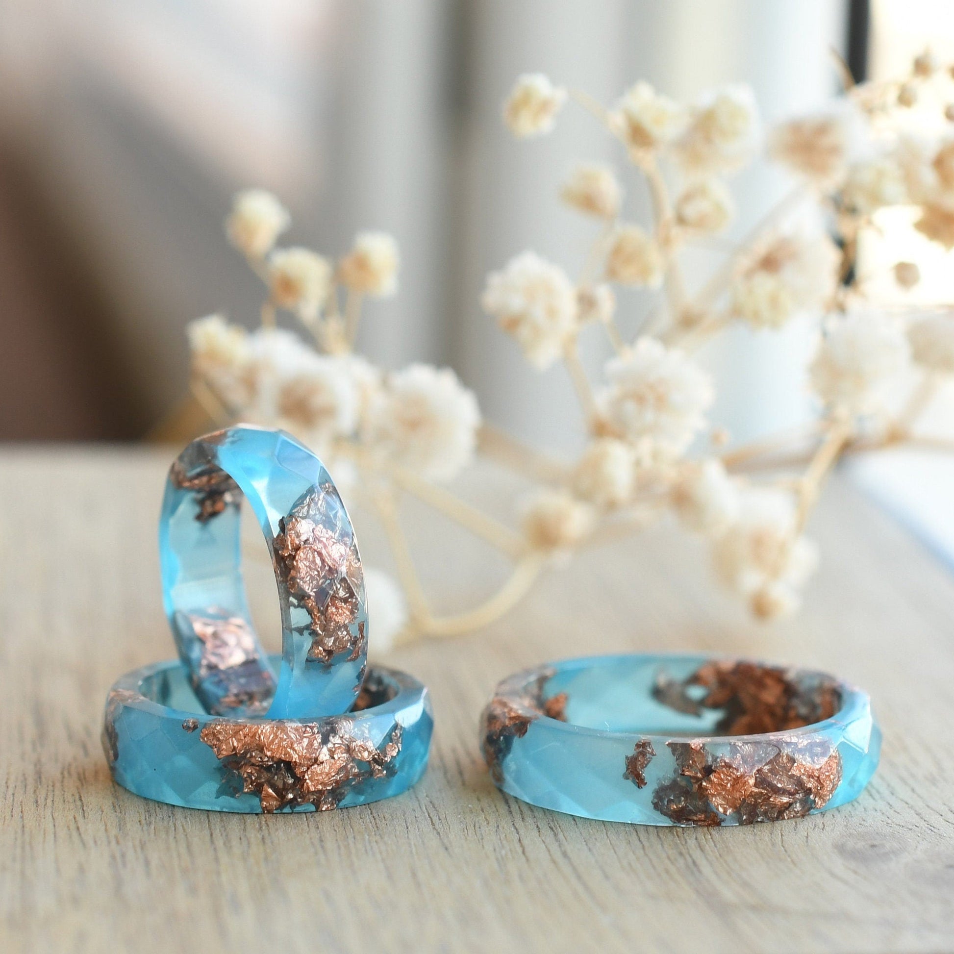 Side view of Blue Ember Ring showing clean lines and smooth resin surface