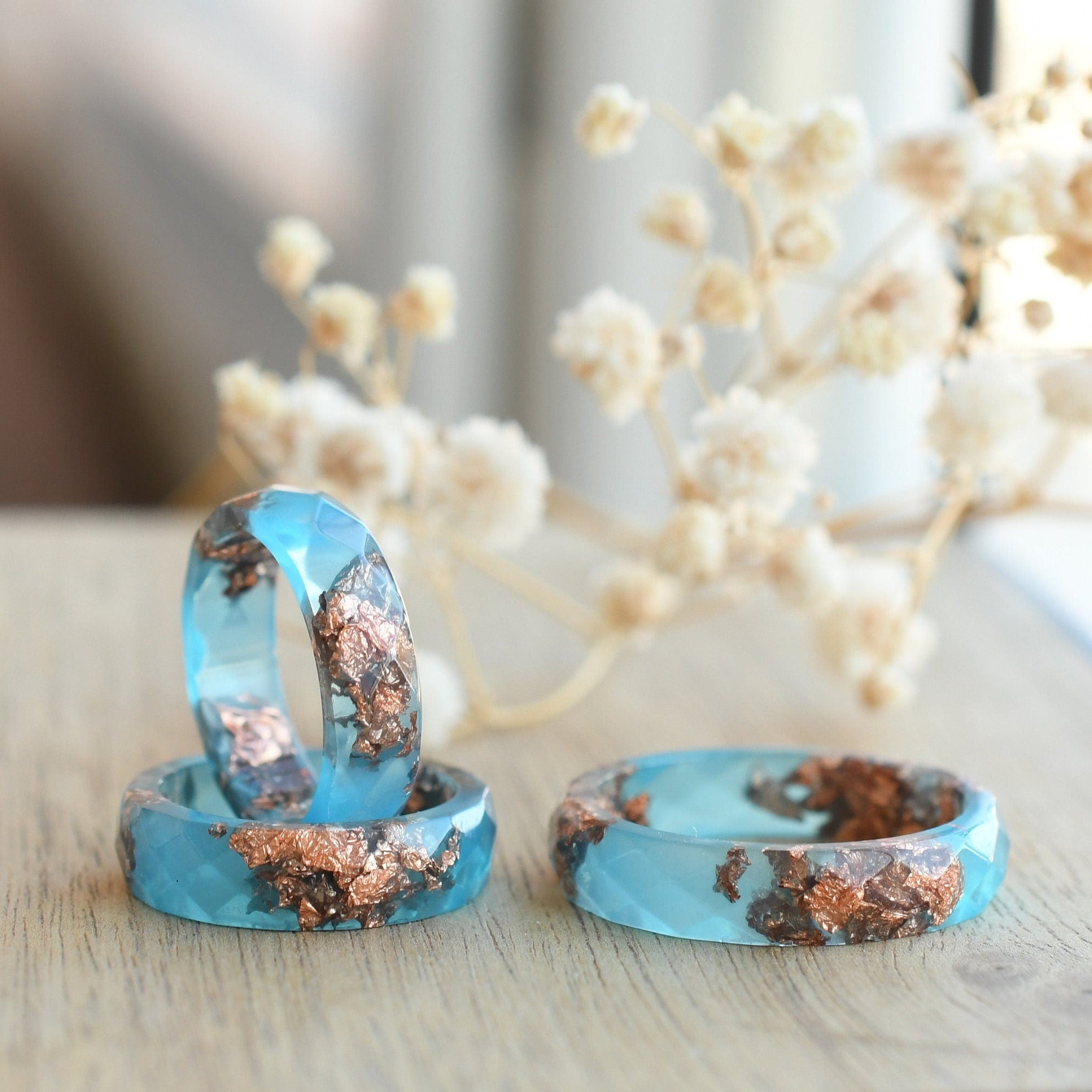 Side view of Blue Ember Ring showing clean lines and smooth resin surface