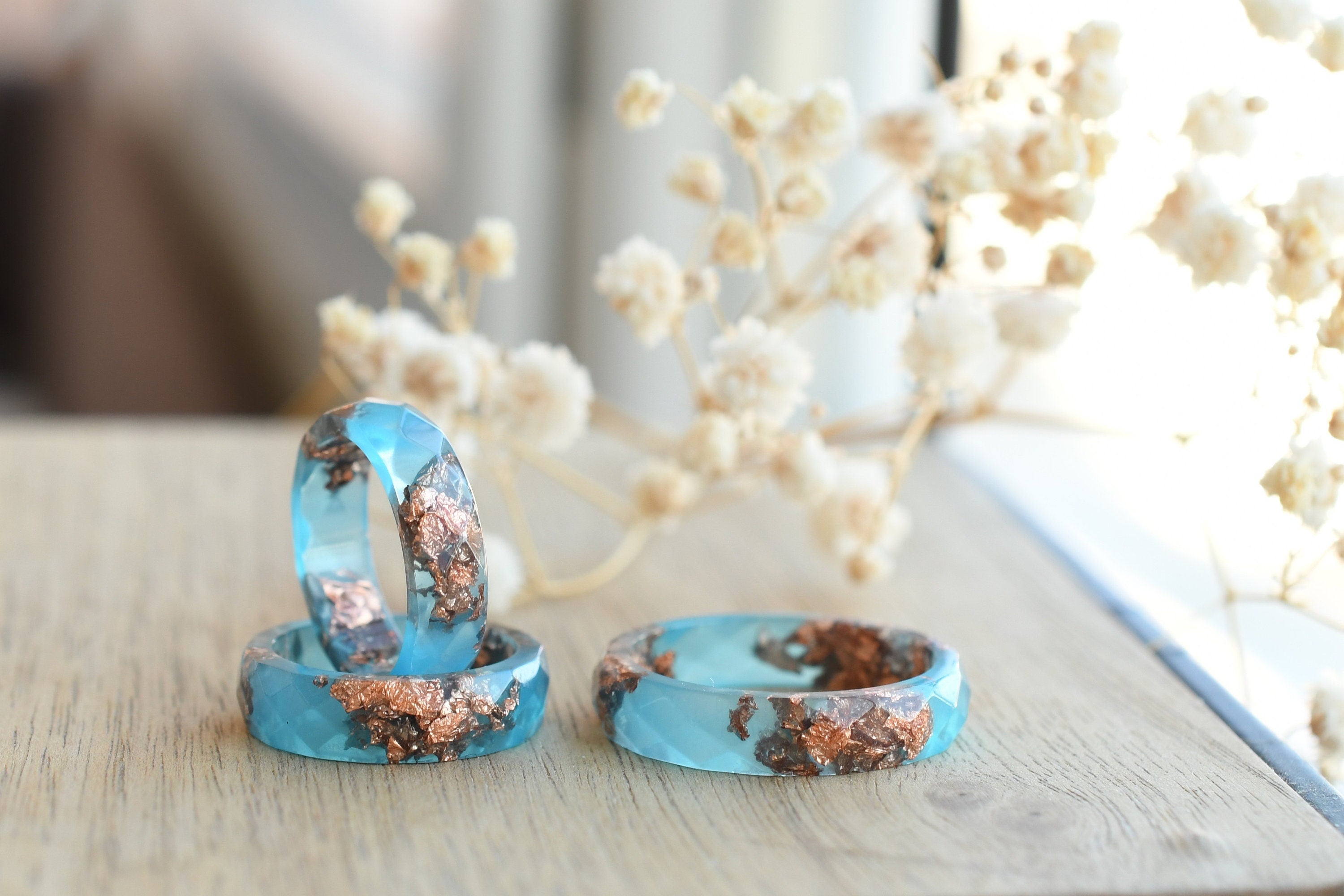 Side view of Blue Ember Ring showing clean lines and smooth resin surface