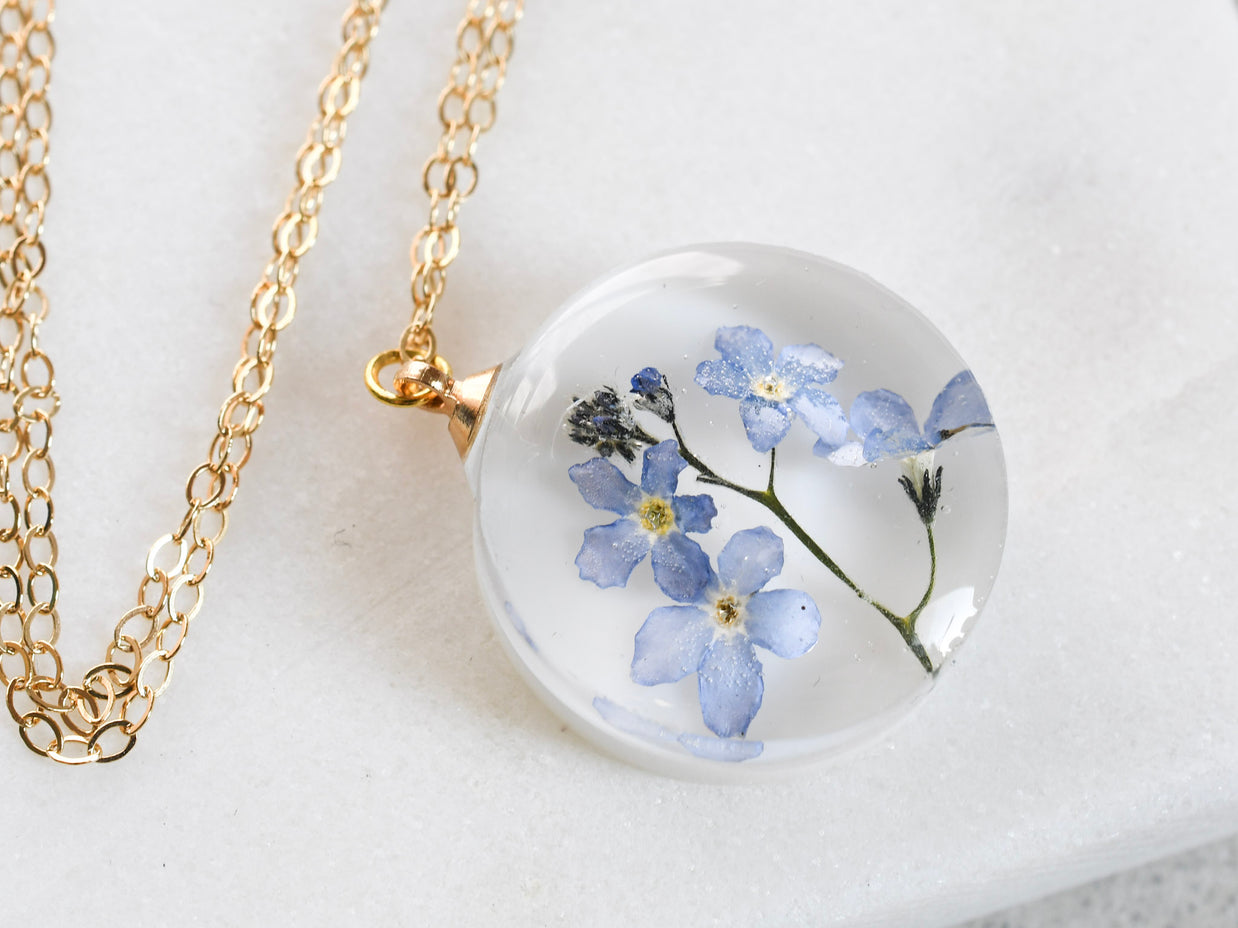 Blue Whisper real flower necklace — minimalist handcrafted jewelry from Austria