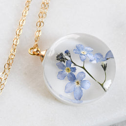 Blue Whisper real flower necklace — minimalist handcrafted jewelry from Austria