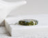 Botanical terrarium necklace with mushrooms, moss, and forget-me-nots