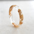 clear 4mm faceted resin ring with gold flakes