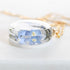 Clear resin necklace with blue flower — 20 mm round pendant crafted by European artisans