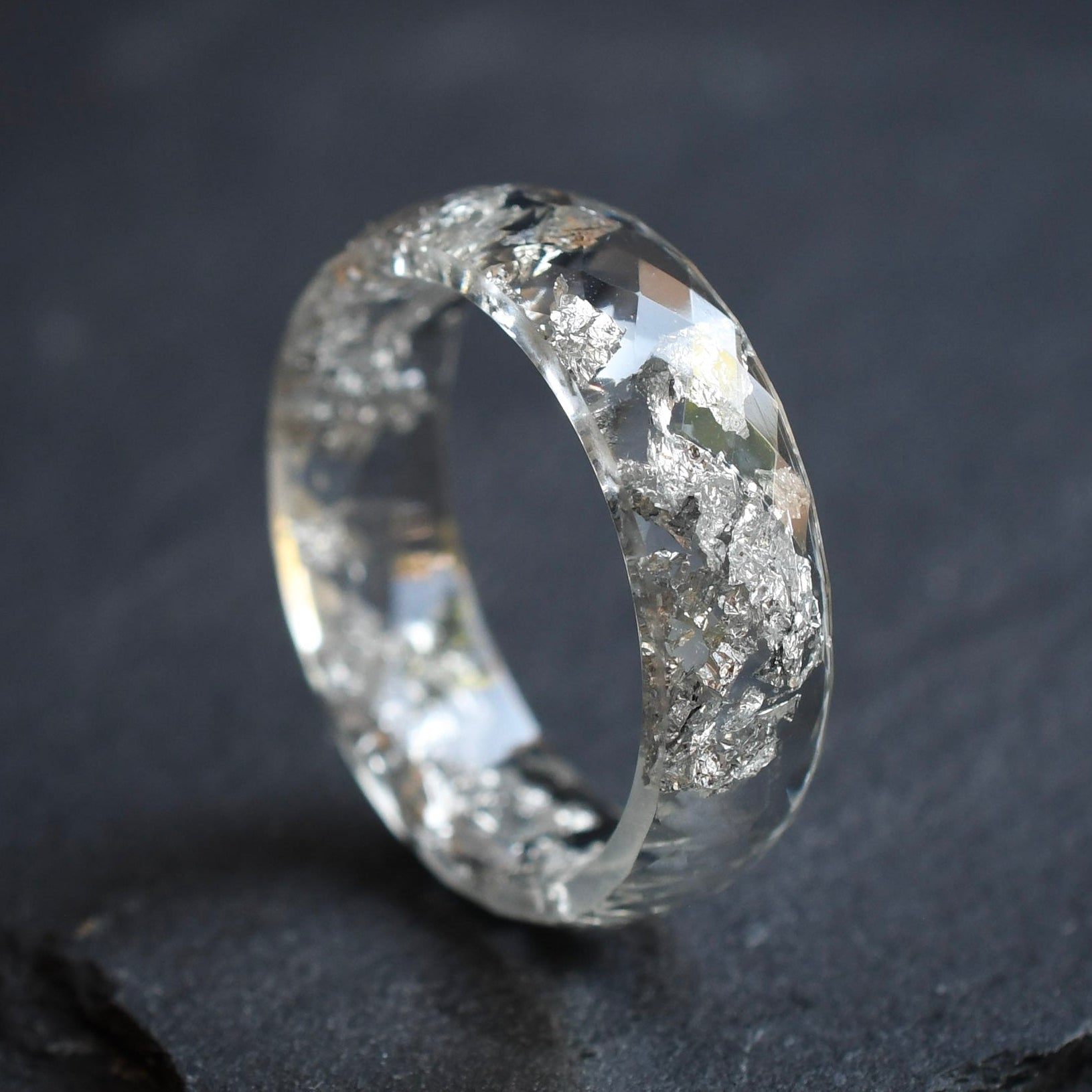 Handmade transparent mens ring with silver leaf faceted resin close-up Vienna craftsmanship