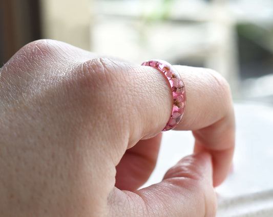 Dainty promise ring with real flower worn on hand