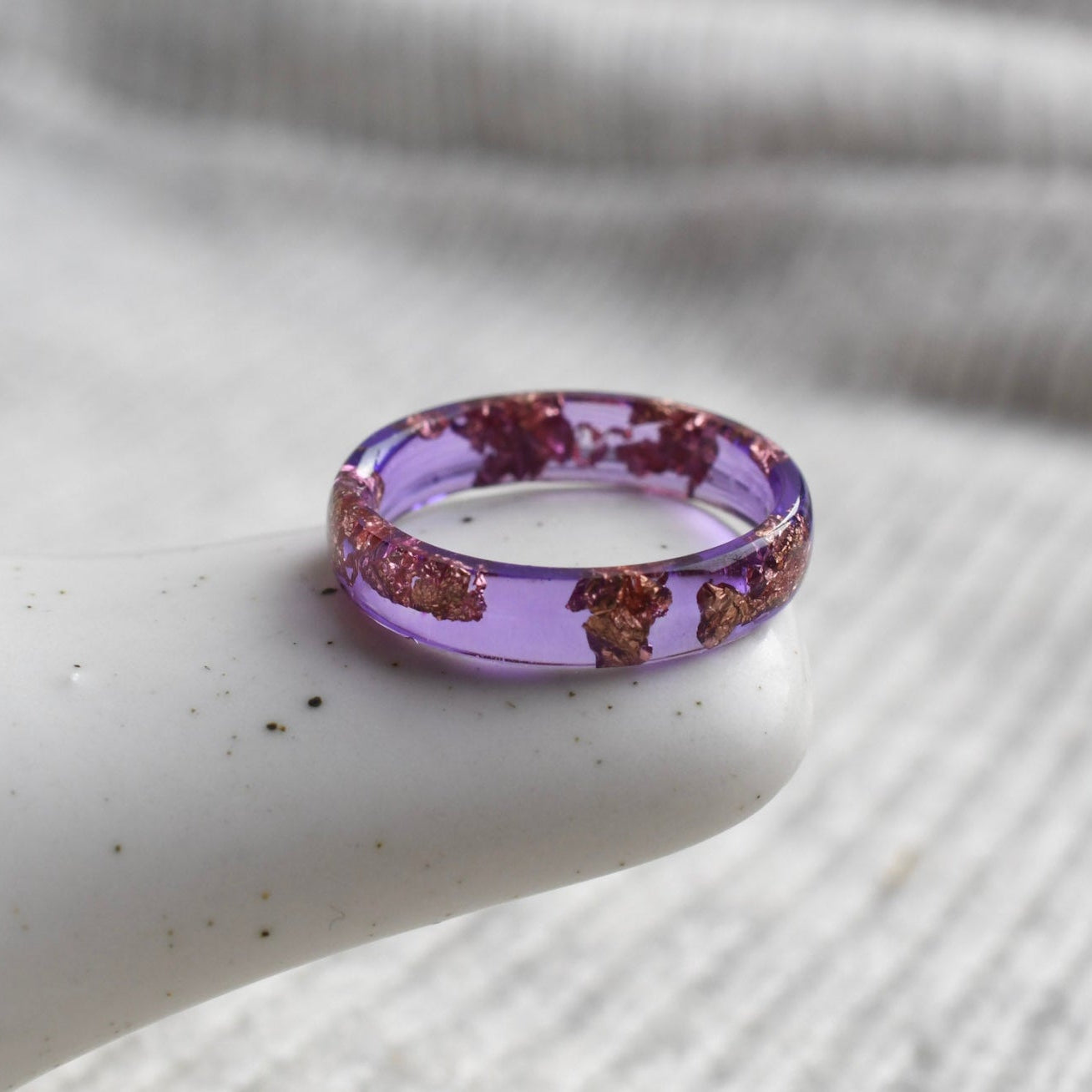 Purple thin stacking resin ring with metallic rose gold flakes — modern minimalist jewelry