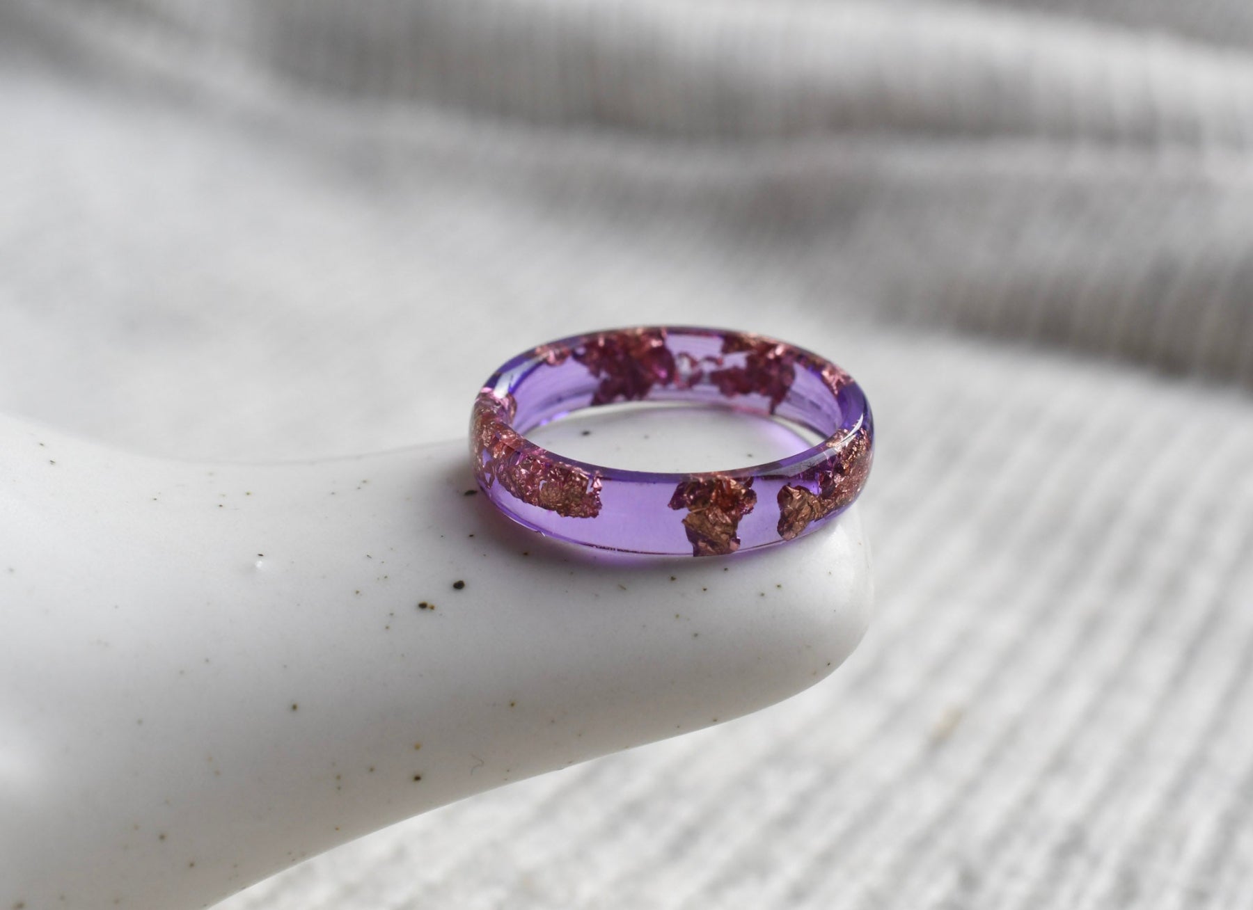 Purple thin stacking resin ring with metallic rose gold flakes — modern minimalist jewelry