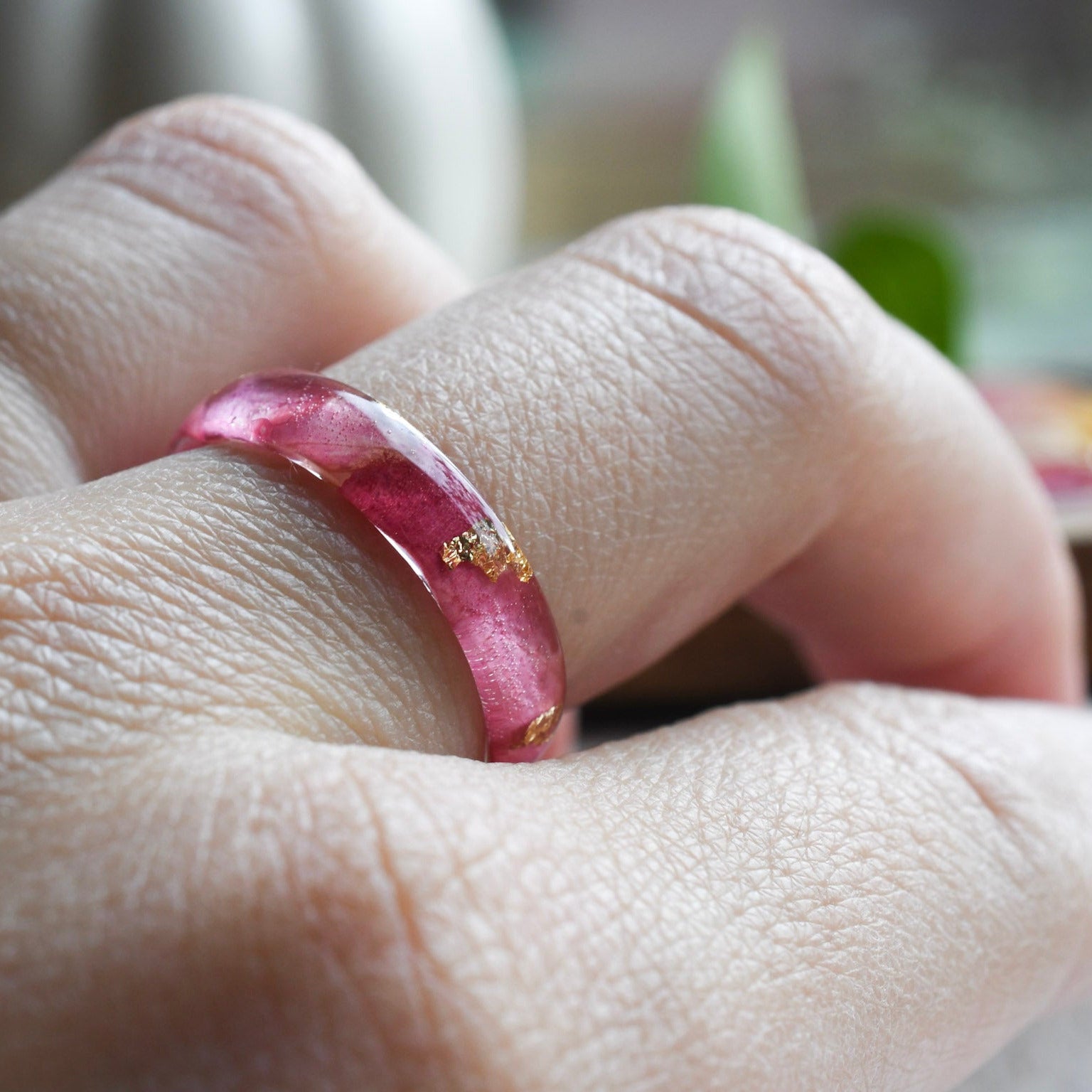 Peony Bloom Ring — real peony leaf preserved in a smooth thin resin band, handcrafted, on model hand