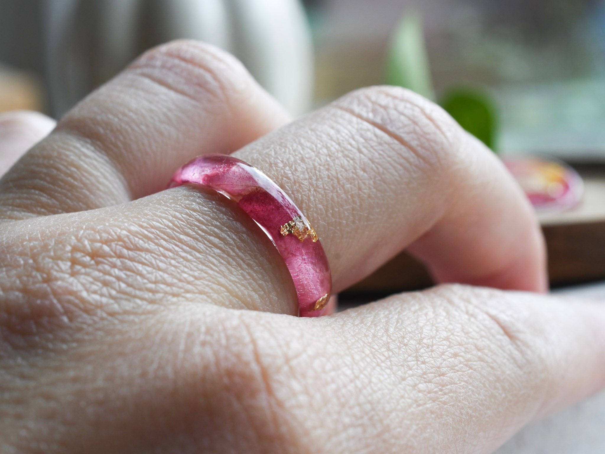 Peony Bloom Ring — real peony leaf preserved in a smooth thin resin band, handcrafted, on model hand