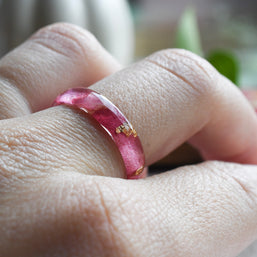 Peony Bloom Ring — real peony leaf preserved in a smooth thin resin band, handcrafted, on model hand