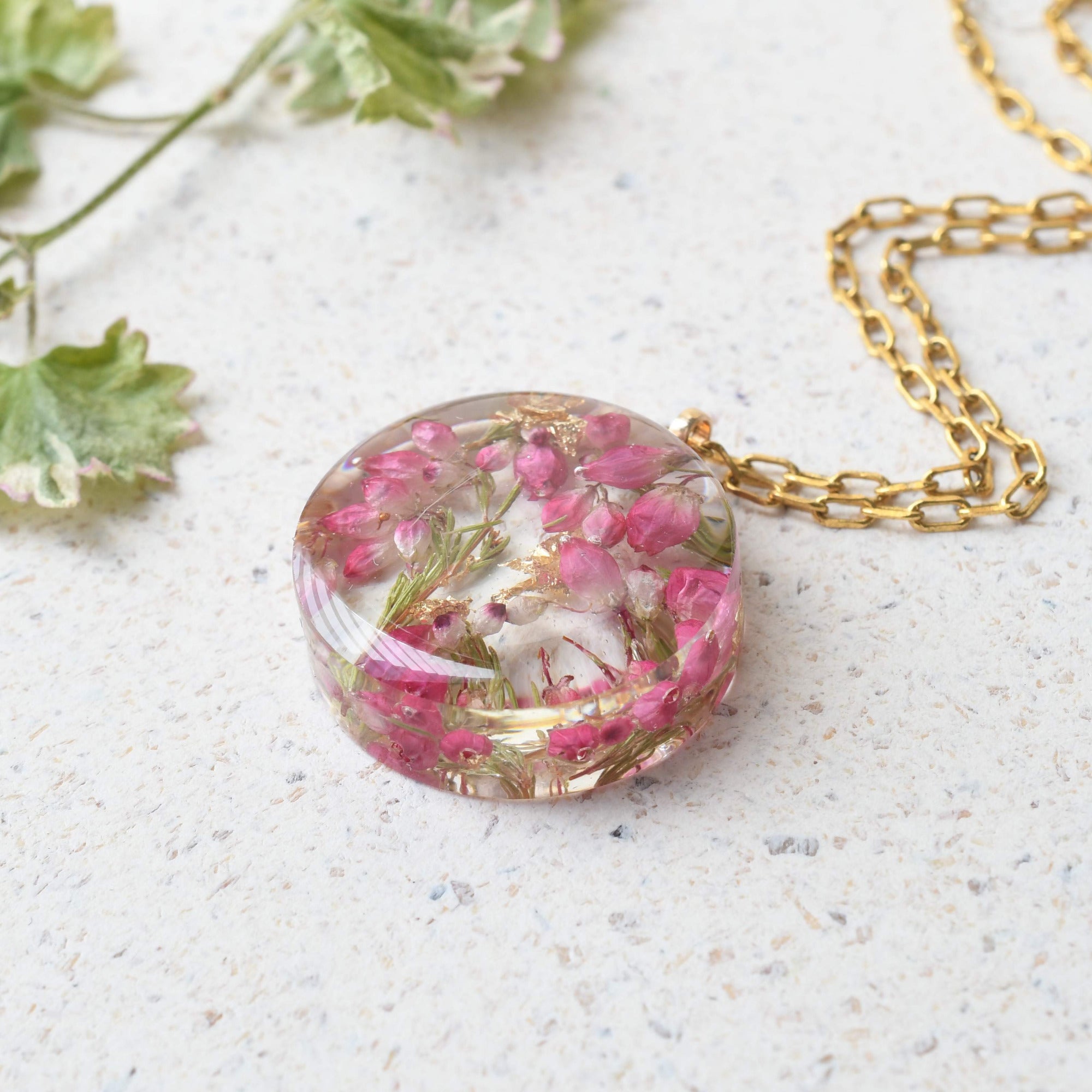 Gold flake resin pendant with real pink heather flowers, handmade jewelry