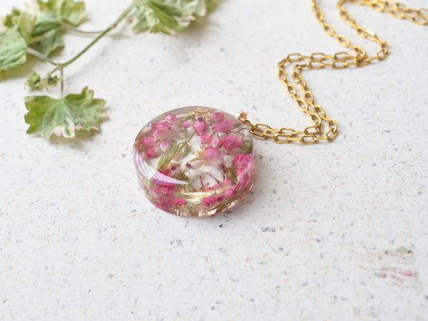 Gold flake resin pendant with real pink heather flowers, handmade jewelry