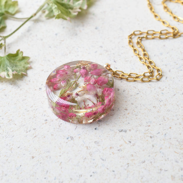 Gold flake resin pendant with real pink heather flowers, handmade jewelry