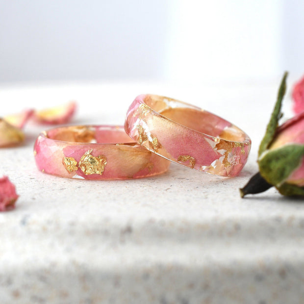Flatlay of Golden Petal Ring showing rose petals and gold leaf inside resin