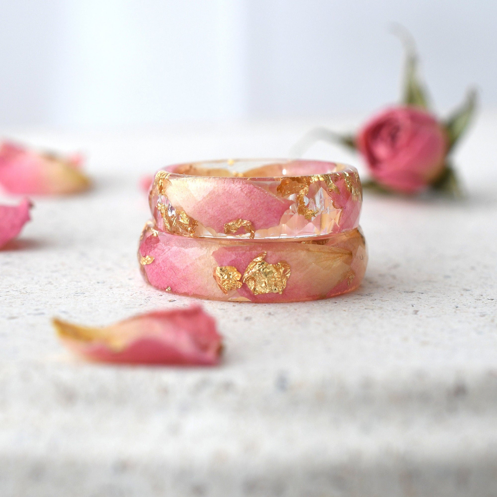 Side view of Golden Petal Ring showing faceted surface and floral inclusions