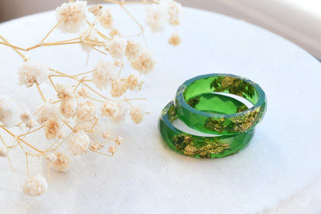 Smooth green resin ring with shimmering gold flakes — bold handmade jewelry