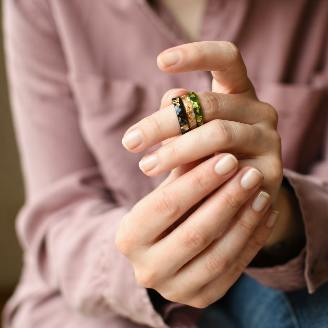 grove stack resin rings worn on hand with earthy tones