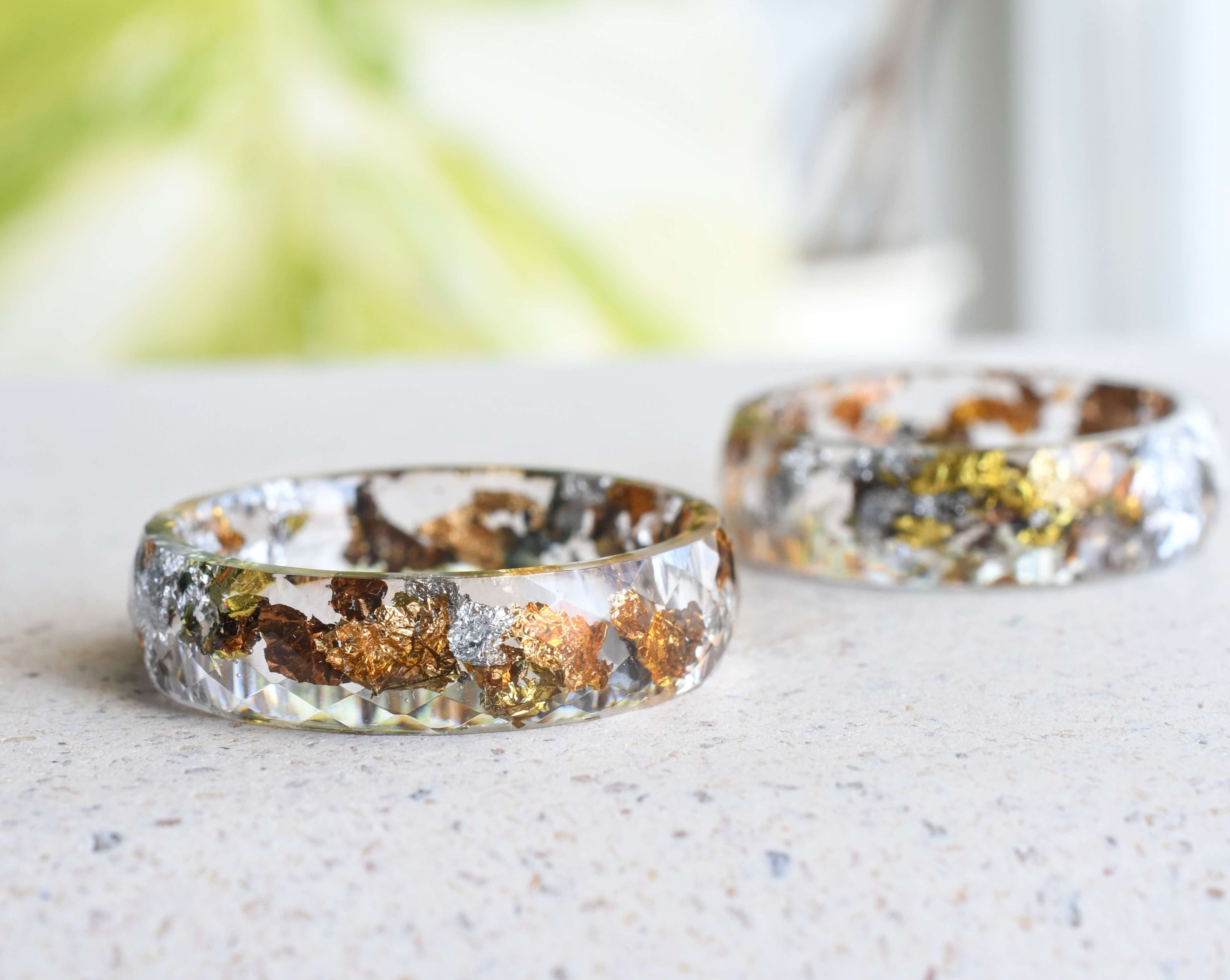 Faceted clear resin ring with gold, silver, and copper flakes — minimalist handmade jewelry
