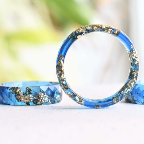 Faceted sapphire resin ring with shimmering gold flakes — minimalist handmade jewelry