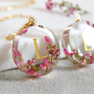 Personalized pink heather resin necklace with name inside pendant handmade by Resity in Vienna
