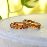 Hypoallergenic resin ring with warm amber tones
