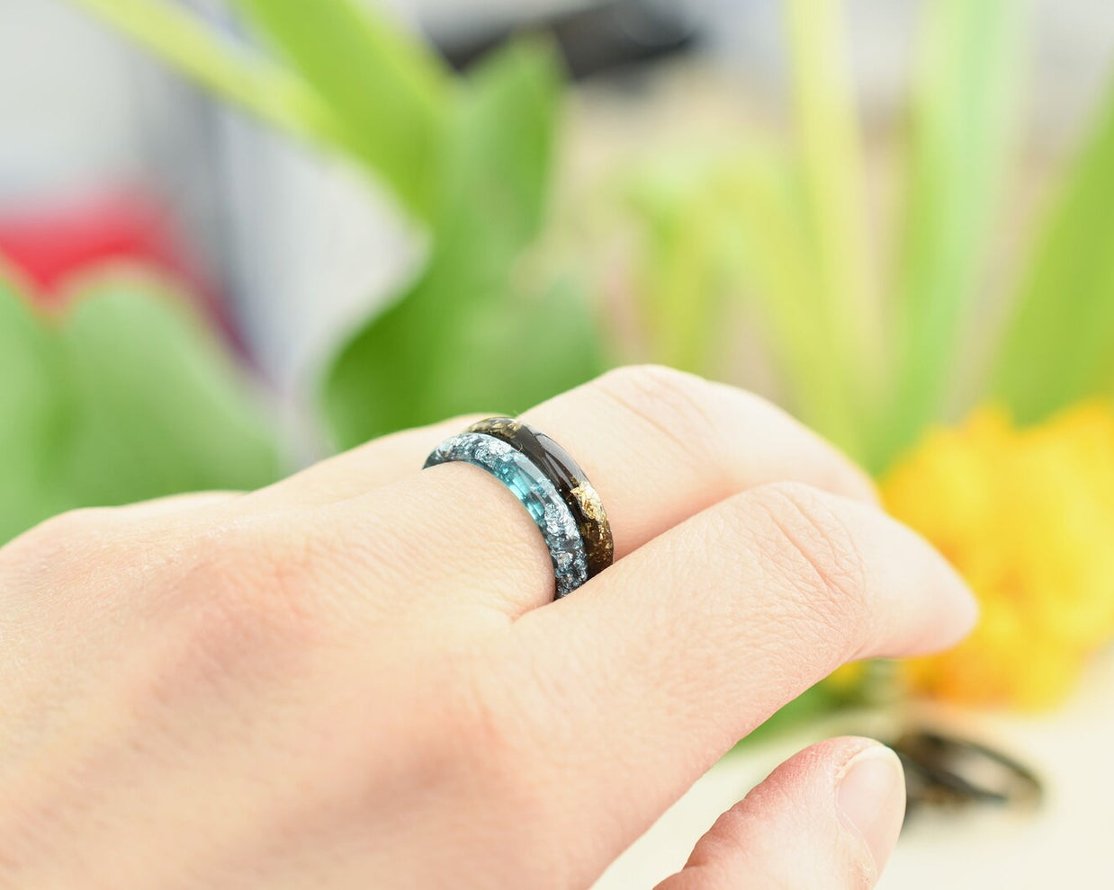 Obsidian Glow smooth black resin ring gold flakes