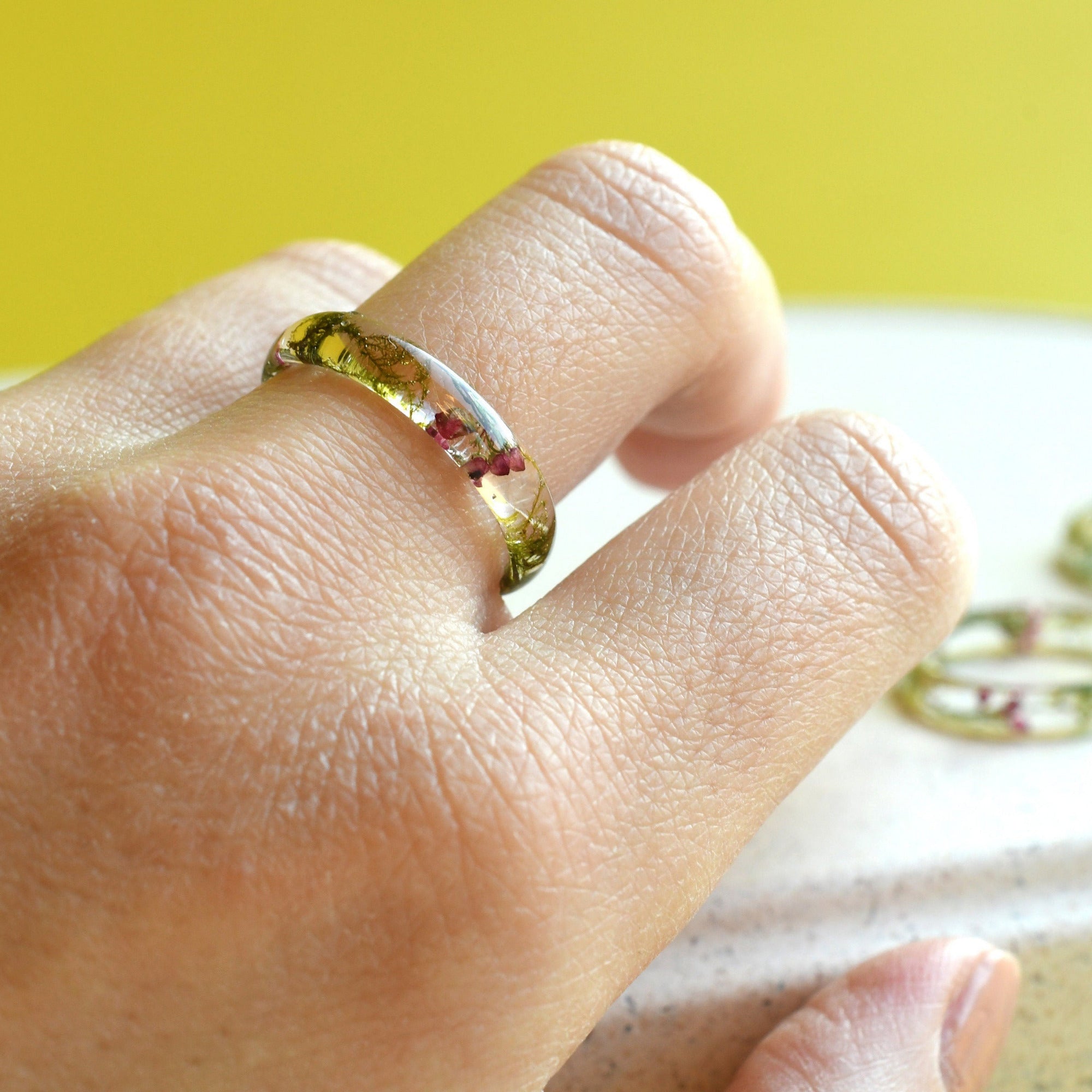 Macro image of the handmade ring featuring a harmonious blend of textures and organic elements.