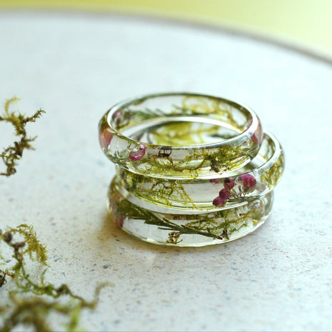 Nature-inspired handmade resin ring with delicate heather flowers – a perfect promise or purity ring