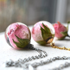 Resin sphere with pink rose