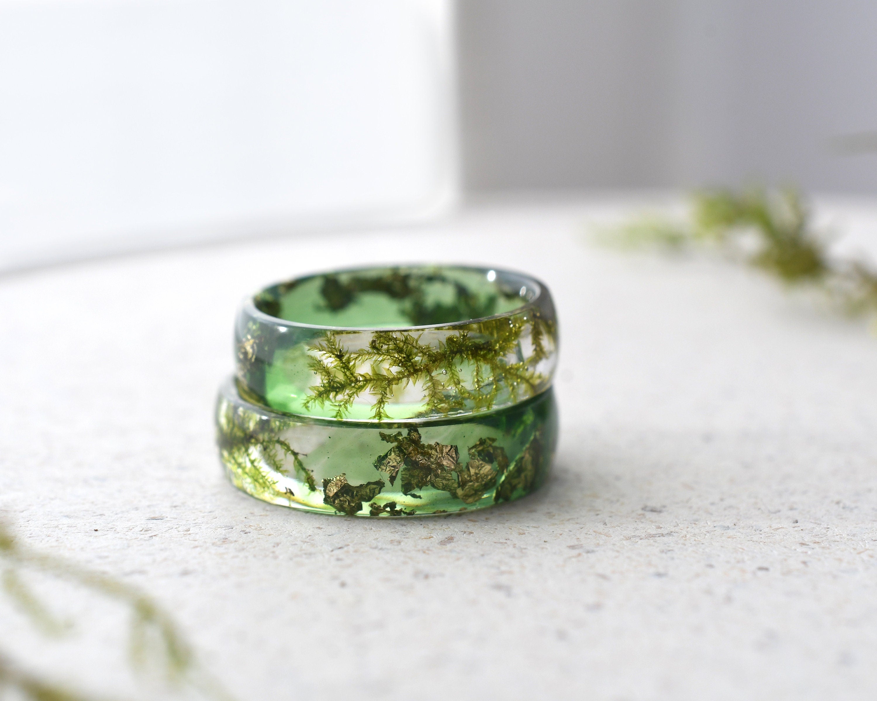 a couple of rings sitting on top of a table